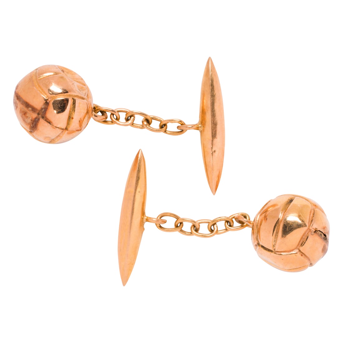 A pair of 14k gold cufflinks: A pair of 14k gold cufflinks Designed as a volleyballs; length 1/2 in; 3.10 grams