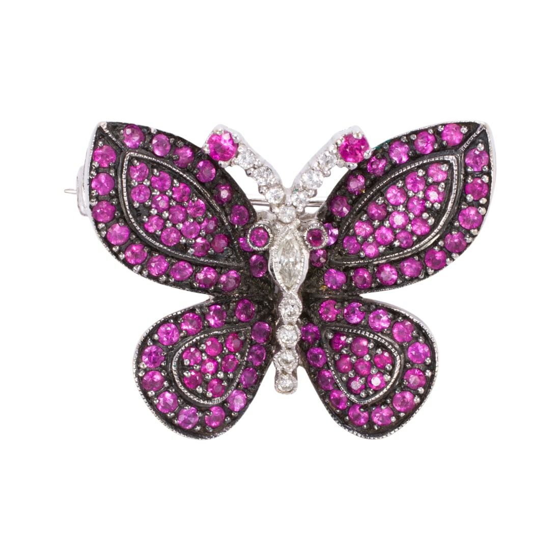 A LeVian pink sapphire, diamond and 14k white gold butterfly brooch: A LeVian pink sapphire, diamond and 14k white gold butterfly brooch densely set with circular-cut pink sapphires weighing approximately 1.90 carats in total, accented by round brilliant-cut and