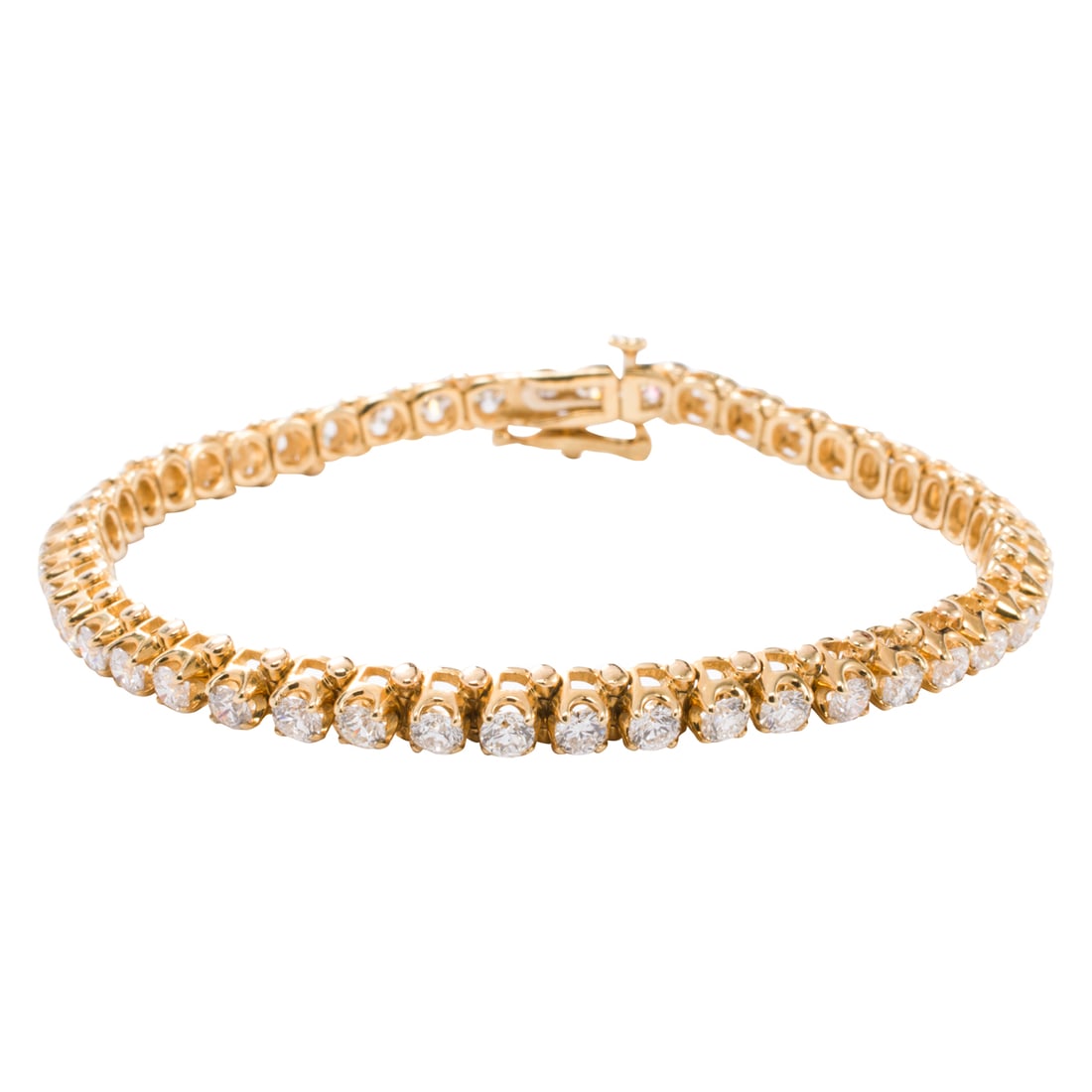 A diamond and 14k gold tennis bracelet: A diamond and 14k gold tennis bracelet set with 47 round brilliant-cut diamonds, weighing in total approximately 5.75 carats; 6 3/4 in; 12.4 grams