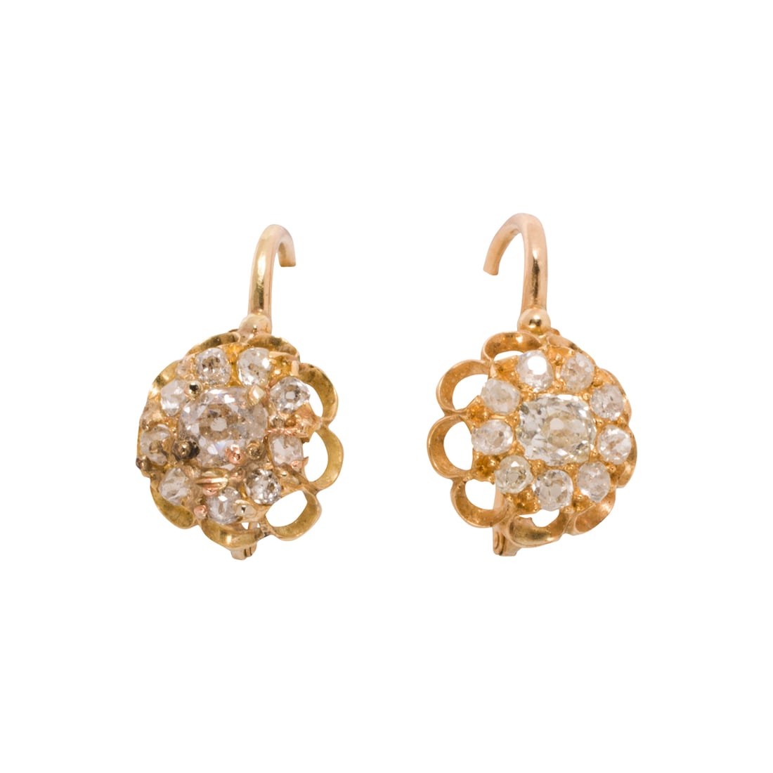 A pair of antique diamond and 15k gold earrings: A pair of antique diamond and 15k gold earrings Centering old mine-cut diamonds, framed by a halo of eight additional old mine-cut diamonds; estimated total diamond weight: 1.10 carats; length: 3/4