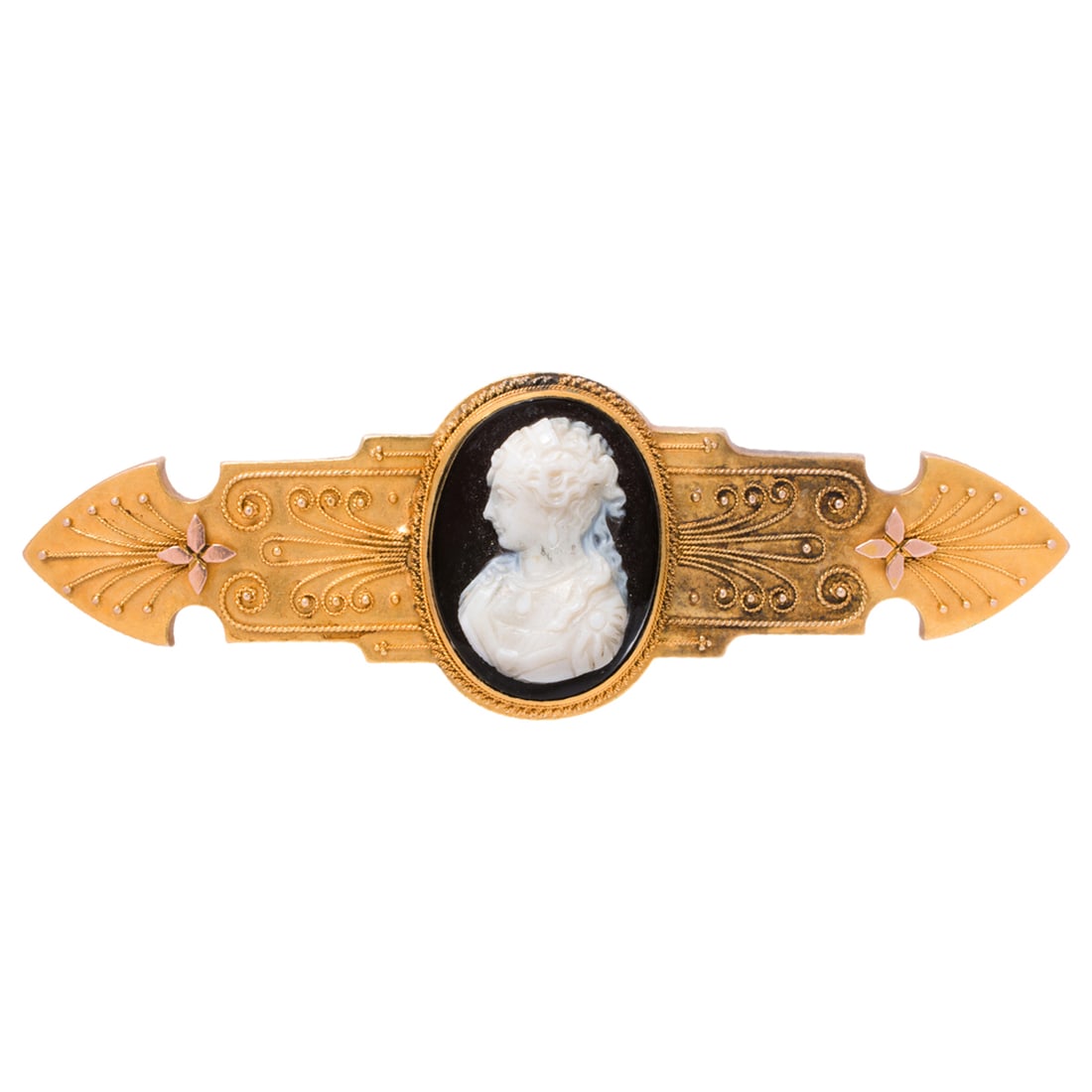An antique cameo and 18k gold brooch: An antique cameo and 18k gold brooch centering an onyx cameo measuring approximately 25.25 x 19.00 mm, length: 3 1/2 in; 16.20 grams