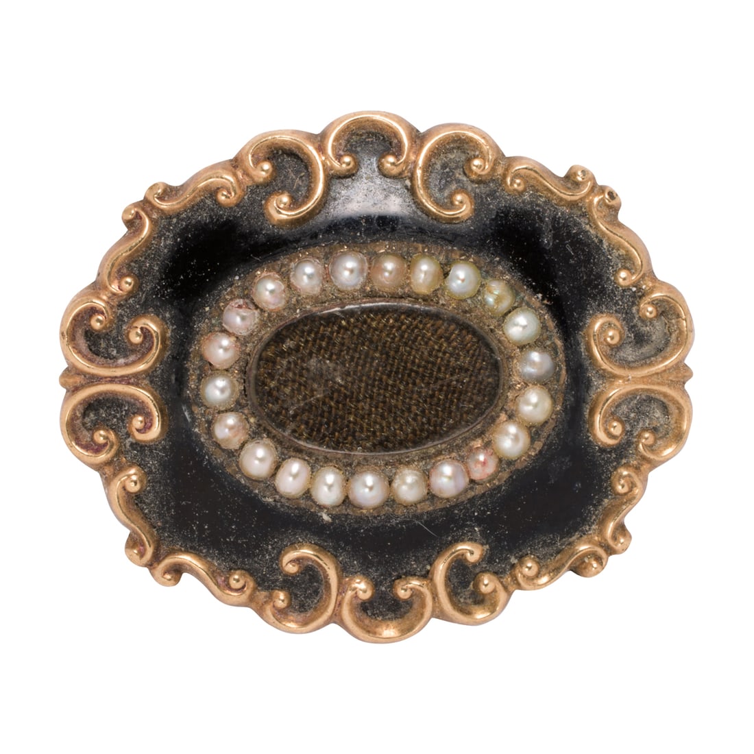 A Victorian seed pearl, enamel, and 10k gold mourning brooch: A Victorian seed pearl, enamel, and 10k gold mourning brooch Centering a transparent compartment framed by seed pearls, within black enameled gold setting; width: 1 1/4 in; 7.90 grams
