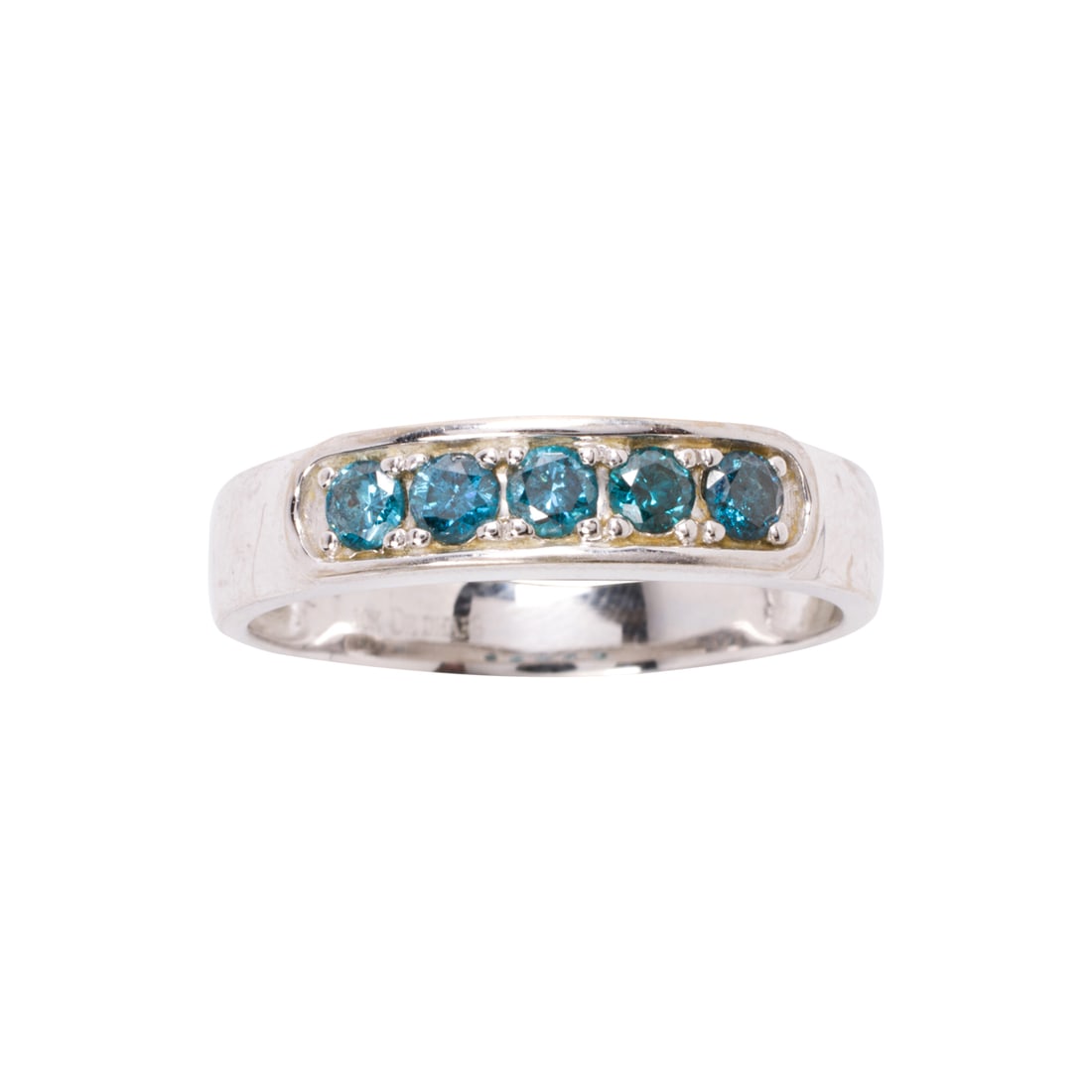 An irradiated blue diamond and 10k white gold ring: An irradiated blue diamond and 10k white gold ring Designed as a line of irradiated round brilliant-cut blue diamonds weighing approximately 0.32 carat in total; size: 10; 2.7 grams