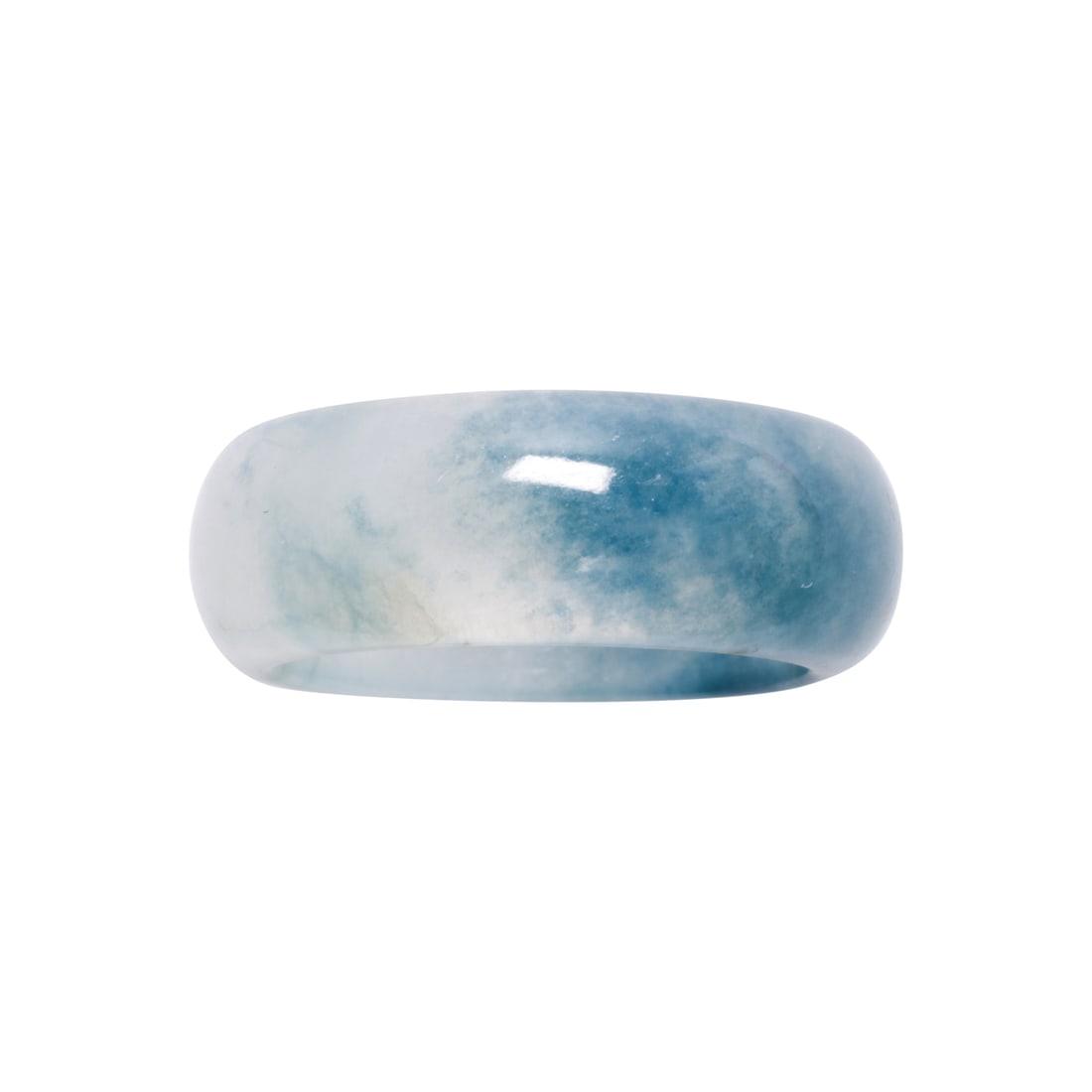 A jadeite band: A jadeite band Designed as a carved band; size: 6 1/4; 3.60 grams Accompanied by GIA report no. 2231780219, dated November 25, 2025, stating Jadeite type A, varigated greenish blue and near colorless,