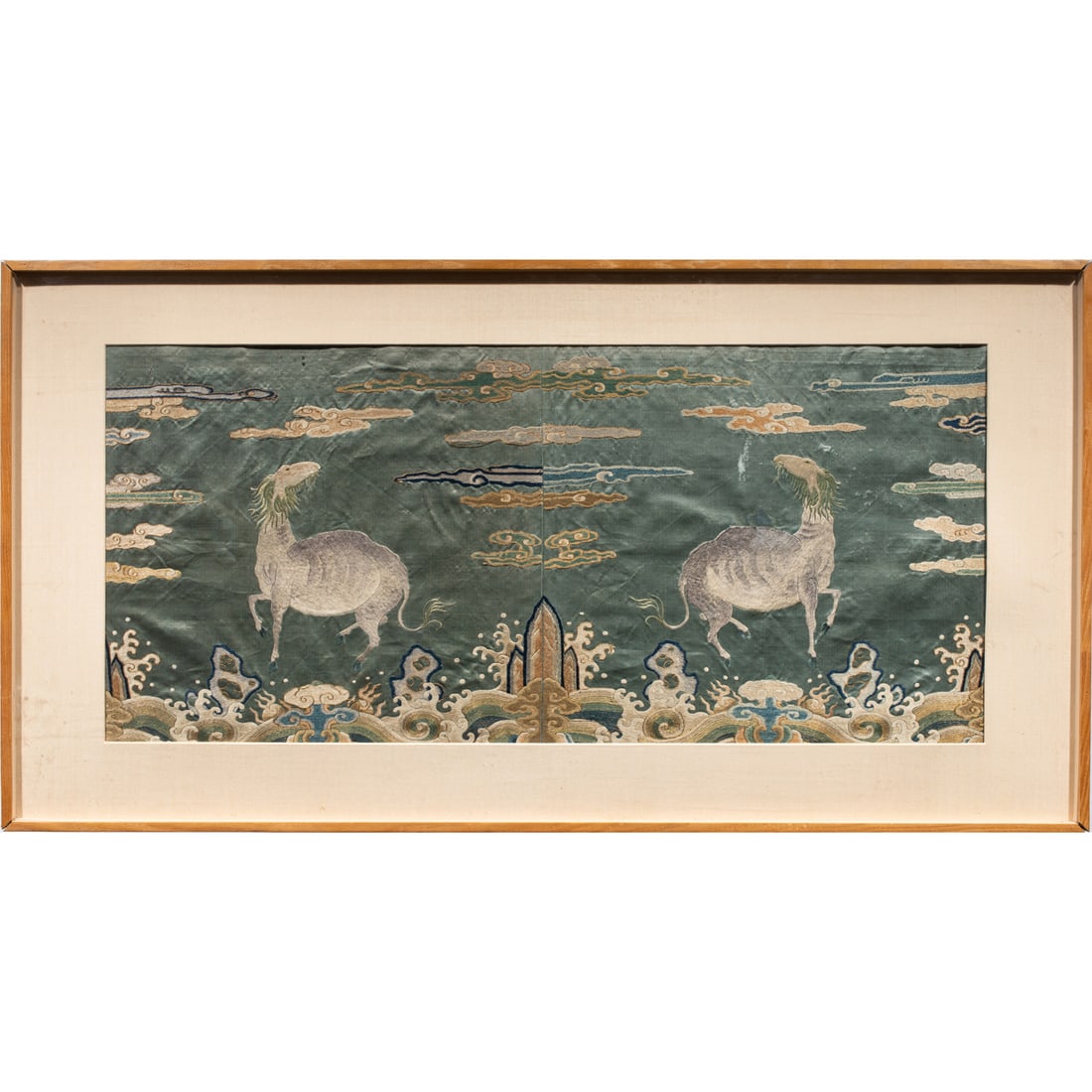A Chinese embroidered mythical beast panel (1 of 1)
