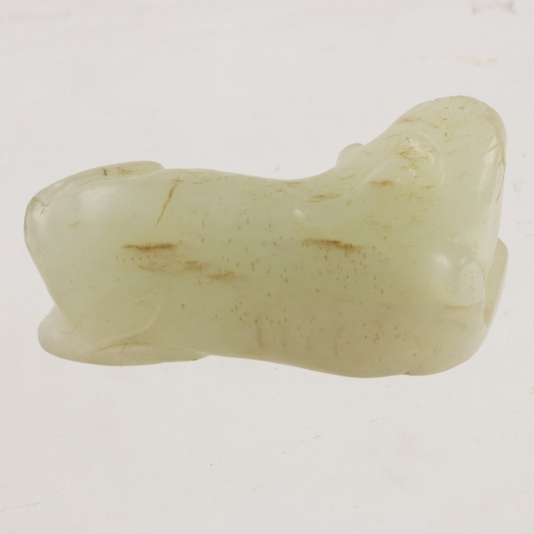 A Chinese white jade beast toggle - 2
