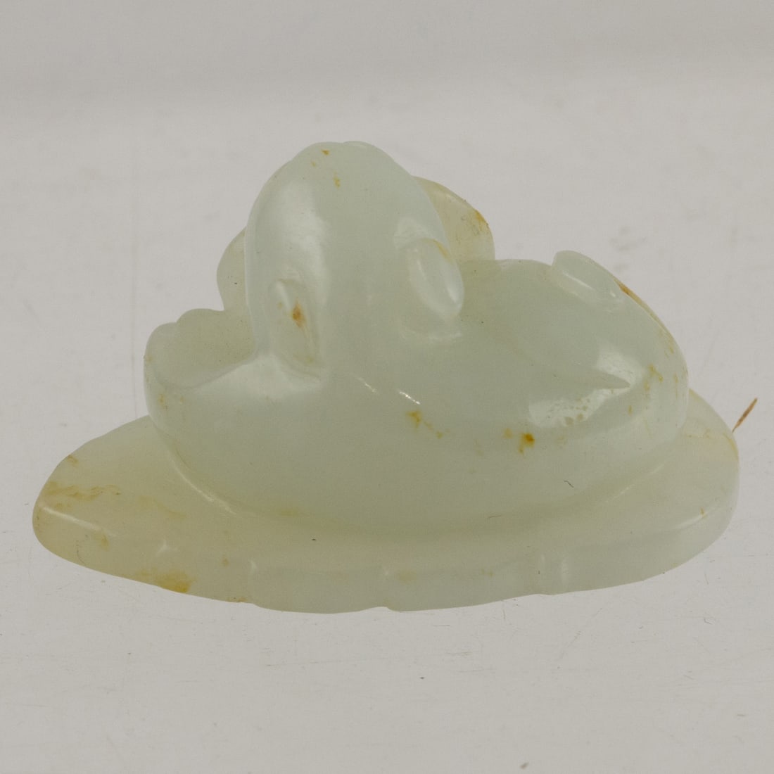 A Chinese white jade cat toggle - 2
