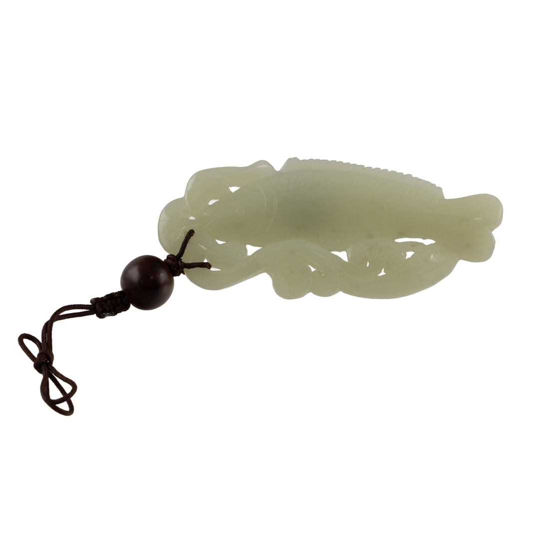 A Chinese white jade fish pendant: A Chinese white jade fish pendant. 3.125" across.