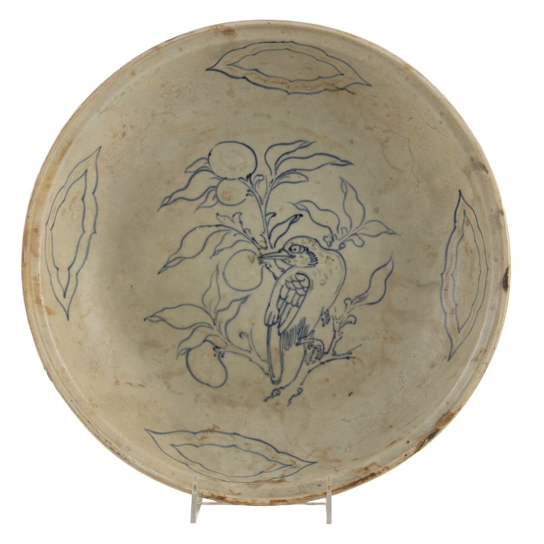 A Vietnamese 'Hoi An Hoard' blue and white charger: A Vietnamese 'Hoi An Hoard' blue and white charger. Decorated with a central bird perched amid fruiting branches, 13.75" wide. Provenance: Butterfield & Butterfield, San Francisco, Treasures from the 