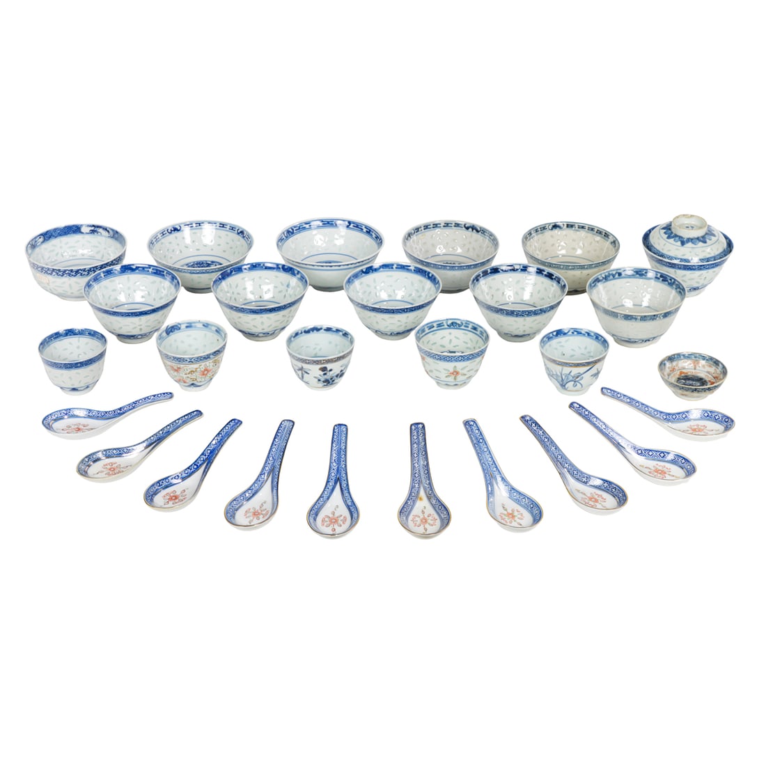 A large group of Chinese blue and white 'rice grain' bowls, cups and spoons (1 of 8)