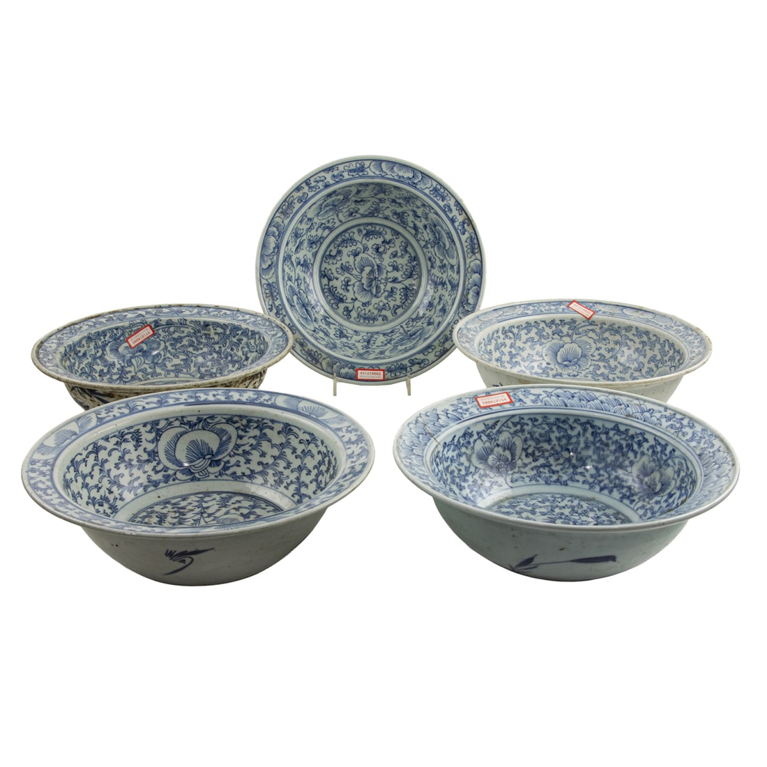 (lot of 5) Chinese blue and white 'lotus' bowls: (lot of 5) Chinese blue and white 'lotus' bowls. 19th century, 11.5" across.