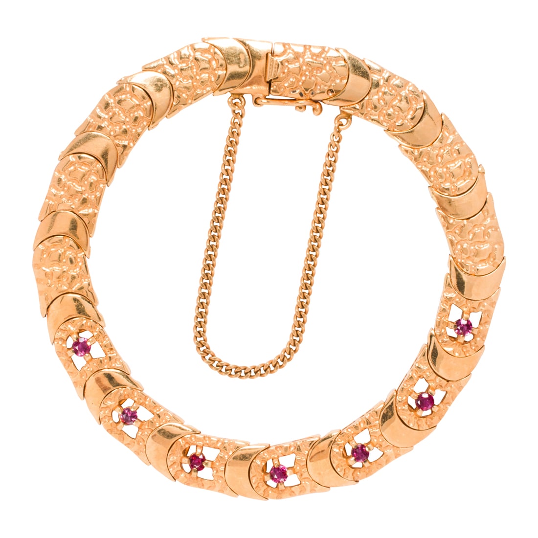A ruby and 18k gold bracelet: A ruby and 18k gold bracelet designed as a fancy-link textured chain featuring 7 circular-cut rubies weighing approximately 0.35 carat in total; length: 7 1/2; 26.60 grams