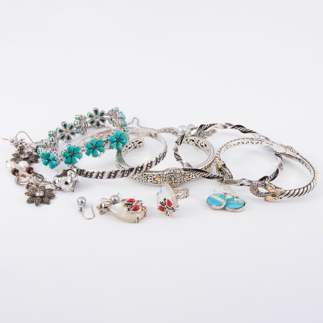 A group of silver jewelry (1 of 1)