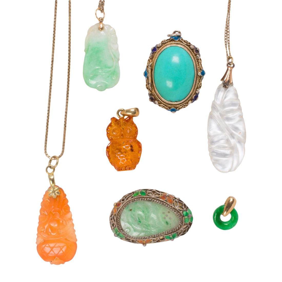 A hardstone and silver group: A hardstone and silver group Comprising an assortment of jewelry designed with silver and various hardstones including jade; gross weight: 29.30 grams