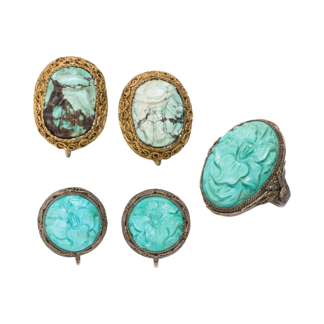 A turquoise and metal ring and two pairs of ear-clips: A turquoise and metal ring and two pairs of ear-clips Featuring carved turquoise cabochons of varying styles, within metal settings; gross weight: 16.30 grams