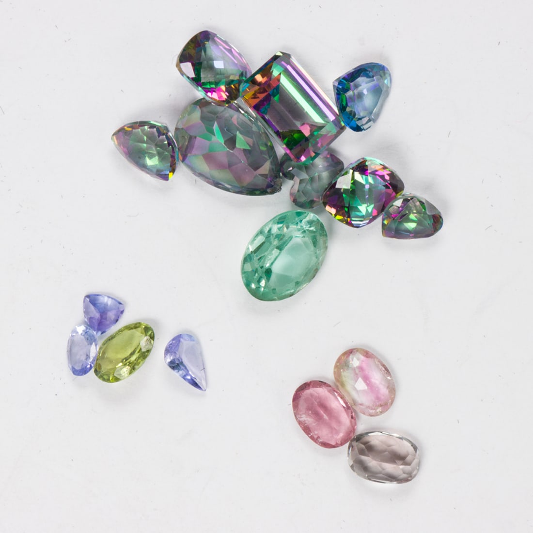 A miscellaneous group of unmounted gemstones: A miscellaneous group of unmounted gemstones Comprising an assortment of unmounted gemstones including tourmaline and tanzanite
