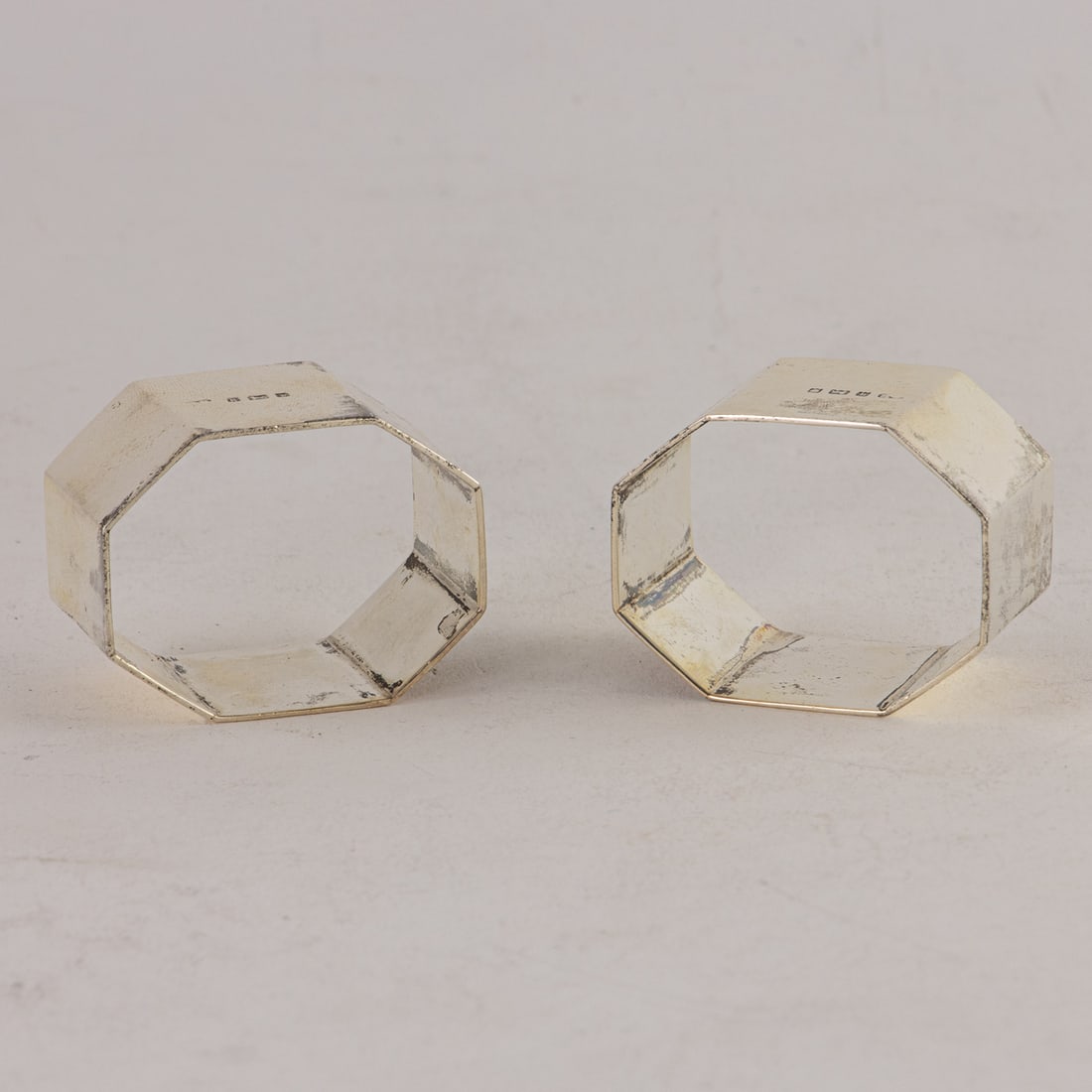 A pair of English sterling silver octagonal napkin rings (1 of 3)