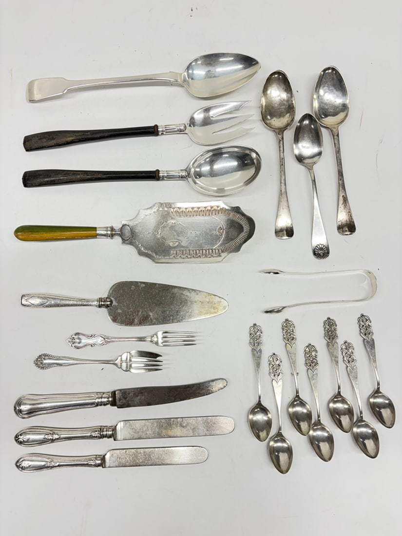 A group of sterling and silver-plated flatware (1 of 2)