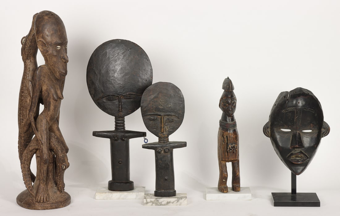 A group of four African figures and a mask (1 of 1)