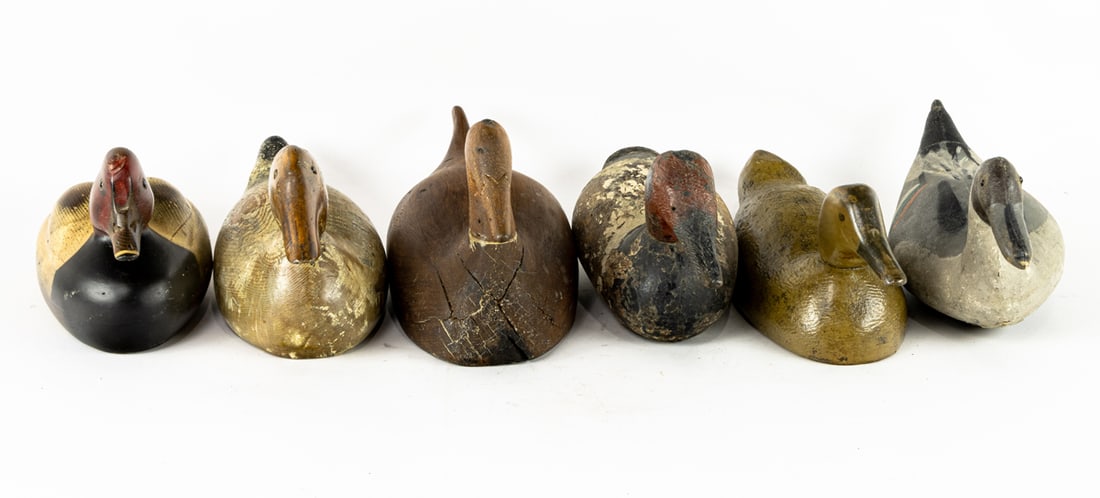 Six carved duck decoys, including a Tom Taber for Ducks Unlimited, dated 1980 (1 of 3)