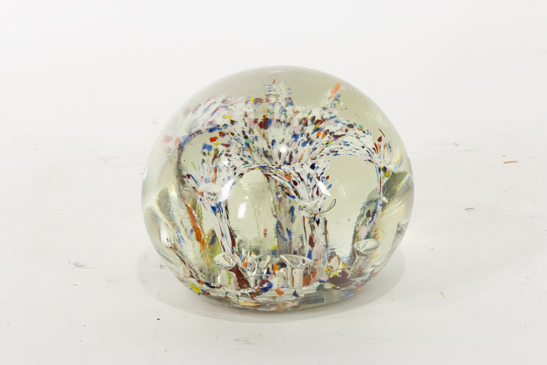 A glass magnum paperweight: A glass magnum paperweight, 3"dia