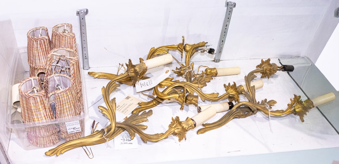 A set of four Louis XV style gilt bronze two-light bras de lumiere or wall sconces: A set of four Louis XV style gilt bronze two-light bras de lumiere or wall sconces, purchased Christie's Interiors, lot 402, November 10, 2009, 14"h (excluding electrical fittings)