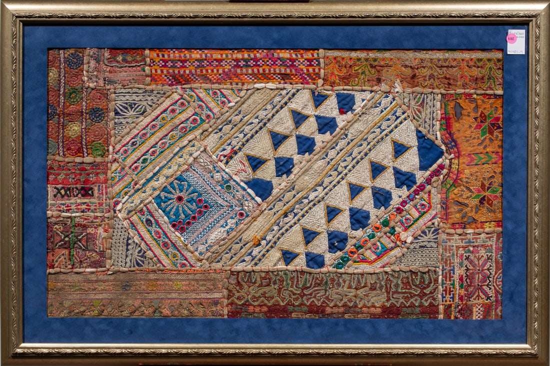 An antique Abkhare: An antique Abkhare, North Persia, handmade textile with metal thread and mirrored accents (Azerbajan), now framed and mounted, sight 19" x 33"; framed 27" x 40.5"