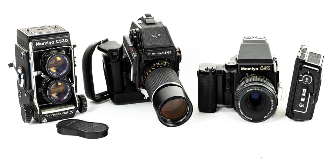 Three Mamiya medium format cameras and accessory (1 of 2)
