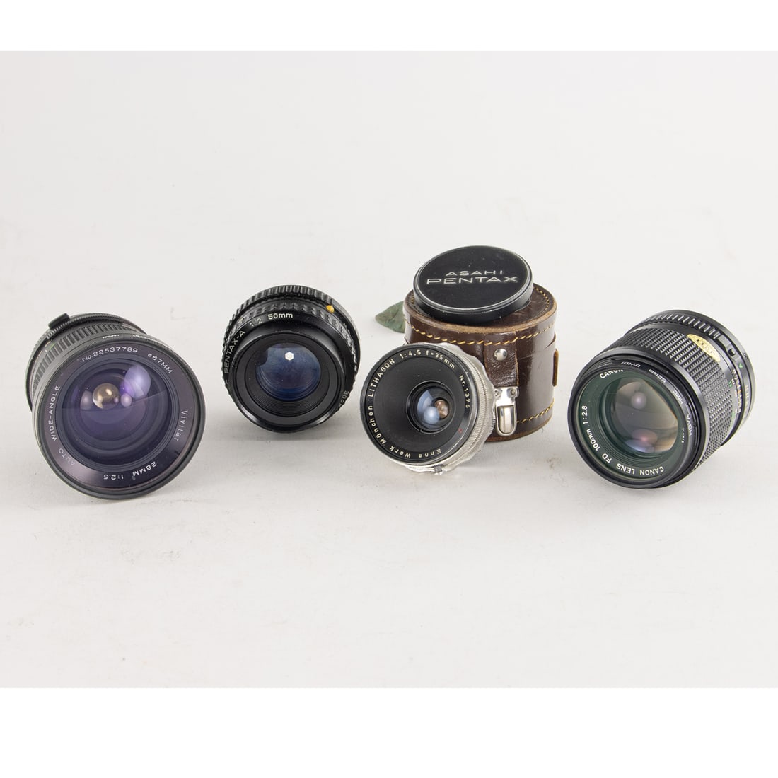 An assembled group of lenses and flashes: An assembled group of lenses and flashes, varouis make and models, [27 total]