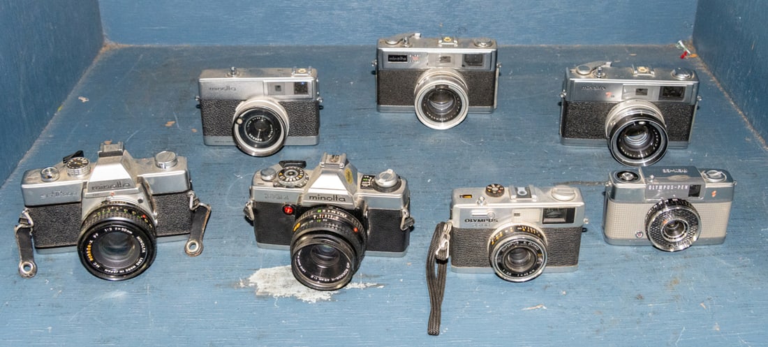 An assembled group of Minolta and Olympus 35 mm cameras (1 of 1)