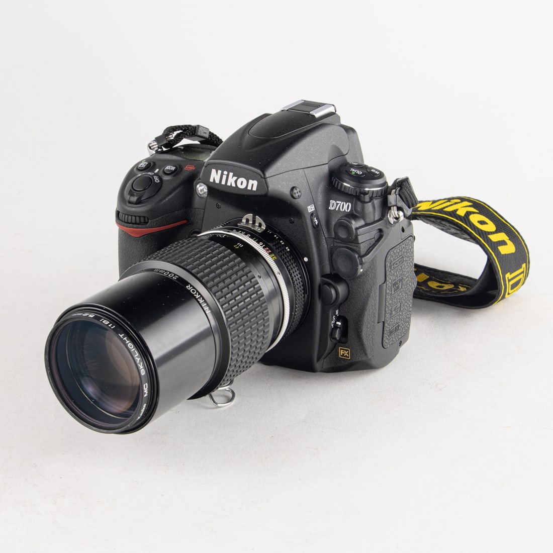 A Nikon D700 dslr camera with soft case and accessories (1 of 2)