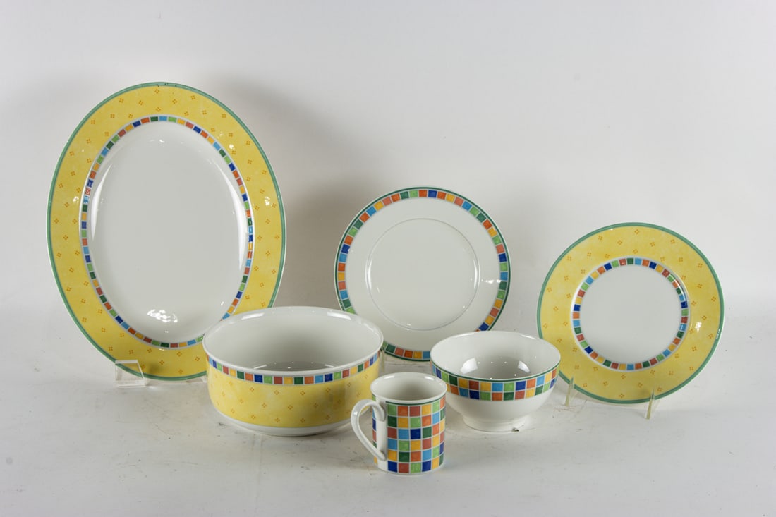 An assembled Villeroy & Boch porcelain dinner service in the 'Twist Alea' pattern in the Limone and: An assembled Villeroy & Boch porcelain dinner service in the 'Twist Alea' pattern in the Limone and Caro designs, comprising (11) dinner plates; (11) dessert plates; (3) chargers; (2) graduated oval