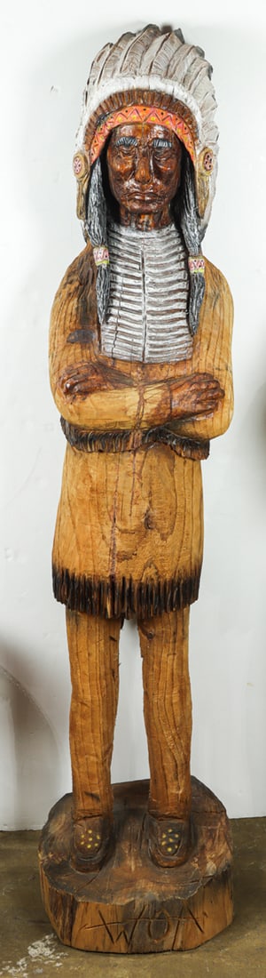 A carved and polychrome tobacco shop figure: A carved and polychrome tobacco shop figure, inscribed 'WOA' to plinth, 78"h x 20"dia
