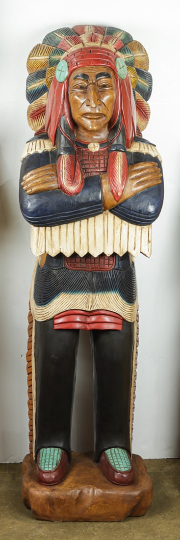 A carved and polychrome tobacco shop figure: A carved and polychrome tobacco shop figure, 71"h x 15"dia