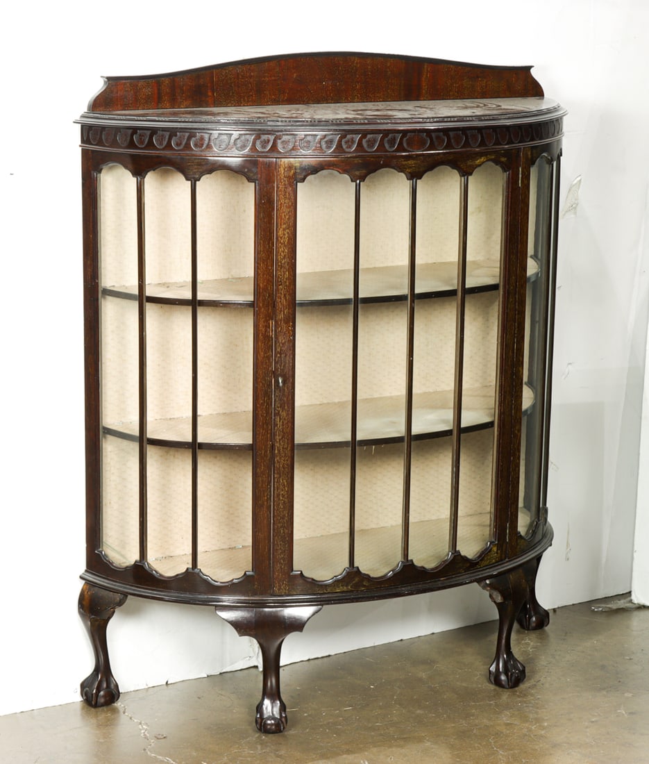 An Art Deco bow front display cabinet: An Art Deco bow front display cabinet, 50"h x 42"w x 15.5"d