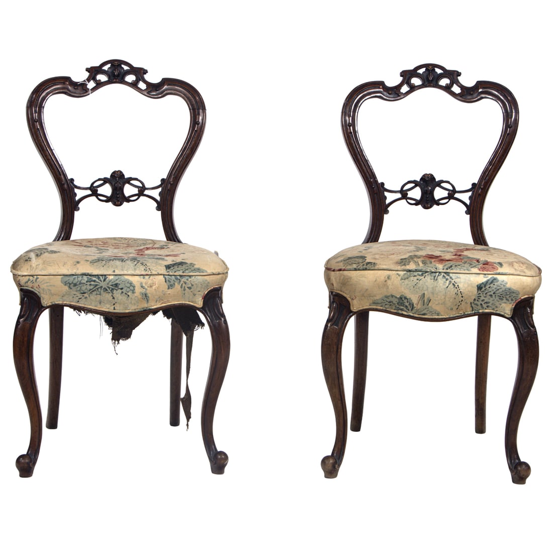 A pair of Rococo Revival balloon-back side chairs: A pair of Rococo Revival balloon-back side chairs, late 19th century, each back incorporating pierced scrollwork, over shaped seat and rising on cabriole legs, 34.5"h x 18.5"w x 16.5"d (seat)