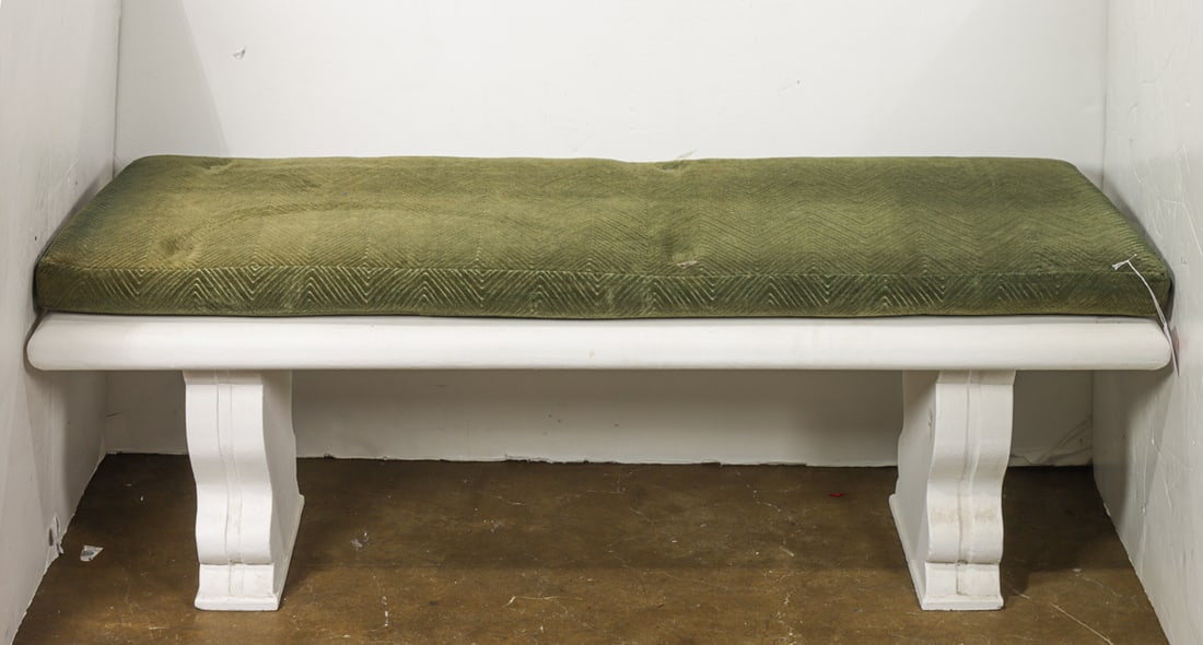 An Arts and Crafts painted bench commissioned for Santa Sabina Center 1930's: An Arts and Crafts painted bench commissioned for Santa Sabina Center 1930's, the thick rectangular top with rounded edges and green padded loose cushion, rising on urn form trestle supports, 18"h x
