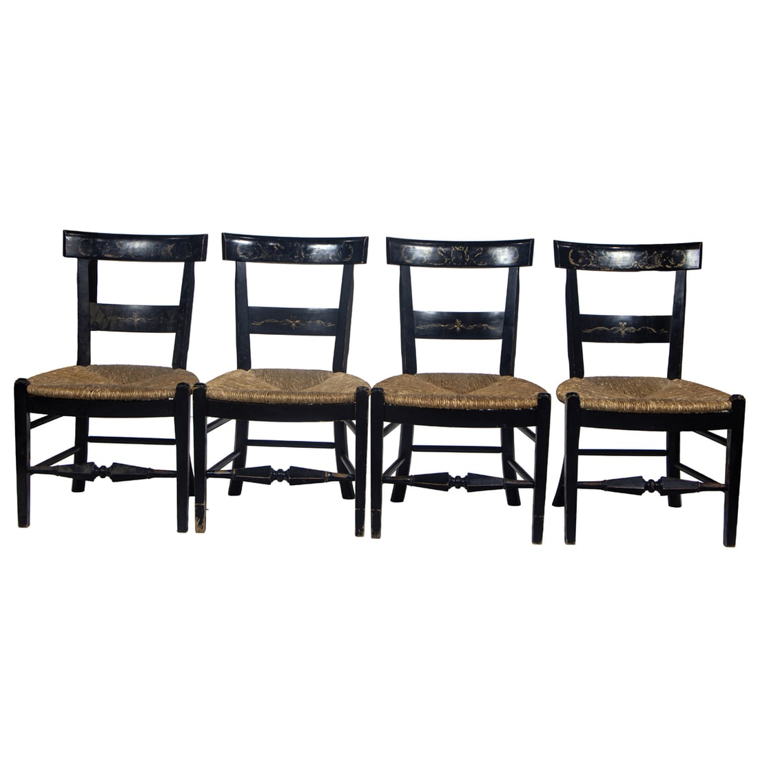 A set of four Hitchcock style side chairs: A set of four Hitchcock style side chairs, each with ebonized and stencil decorated frame and rush seat, 34"h x 21"w x 19.5"d (seat), Provenance: From the Estate of Margaret G. Huntington; by descent