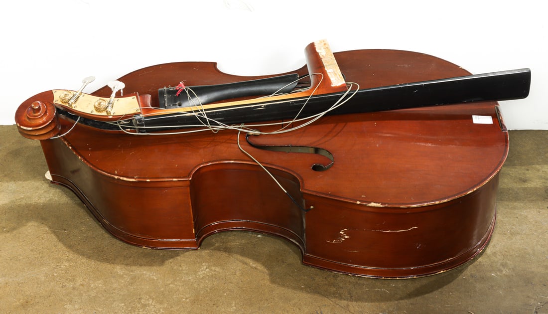 A Cremona three-quarter bass: A Cremona three-quarter bass, labeled, (note: neck needs reassembly), body 43"l x 26"w, neck 47"l
