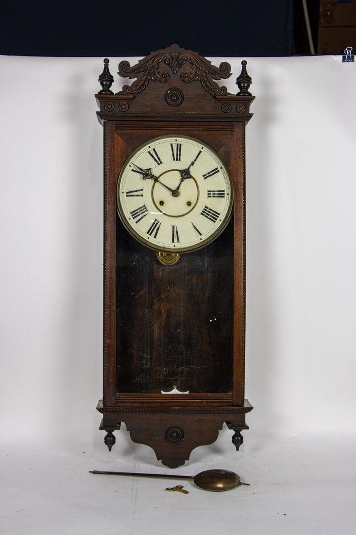A late Victorian Waterbury regulator wall clock 8-day, time/strike, key wind, 43"h x 16"w x 5 (1 of 3)