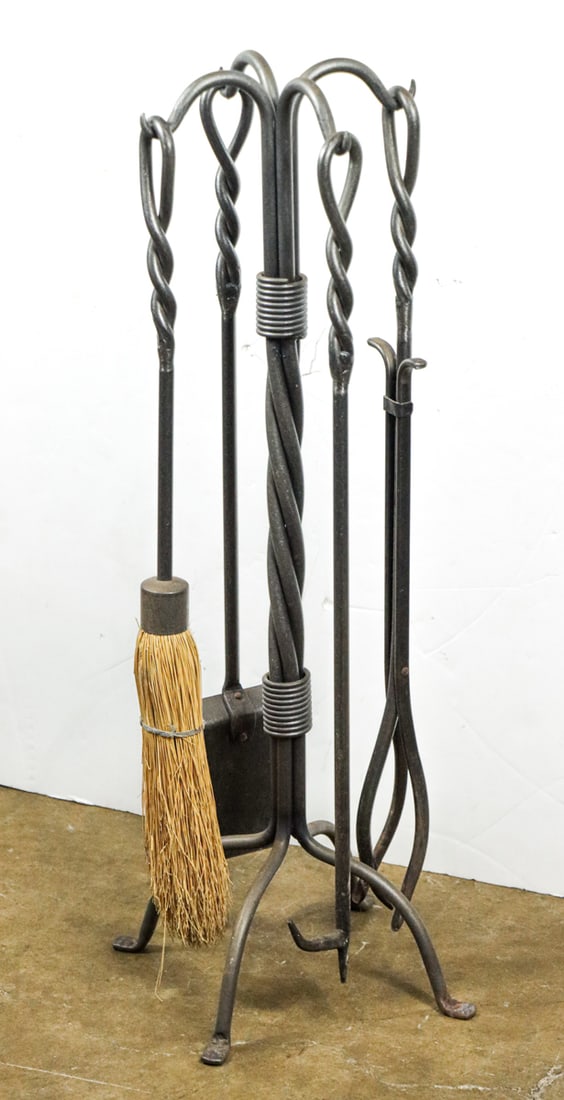 A Contemporary four-piece fire tool set in stand: A Contemporary four-piece fire tool set in stand, 31.5"h