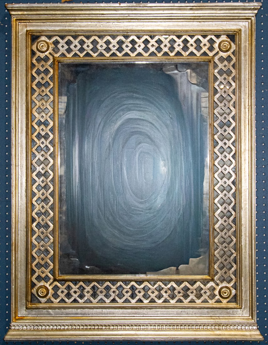 A large silvered wood mirror: A large silvered wood mirror, with lattice border, 43.5"h x 33.5"w