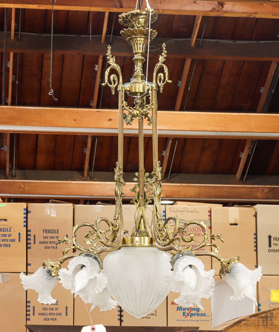 A custom Victorian style gilt metal six light chandelier: A custom Victorian style gilt metal six light chandelier, each with a ruffle shade surrounding the large central frosted and etched shade, 33"h x 26"w