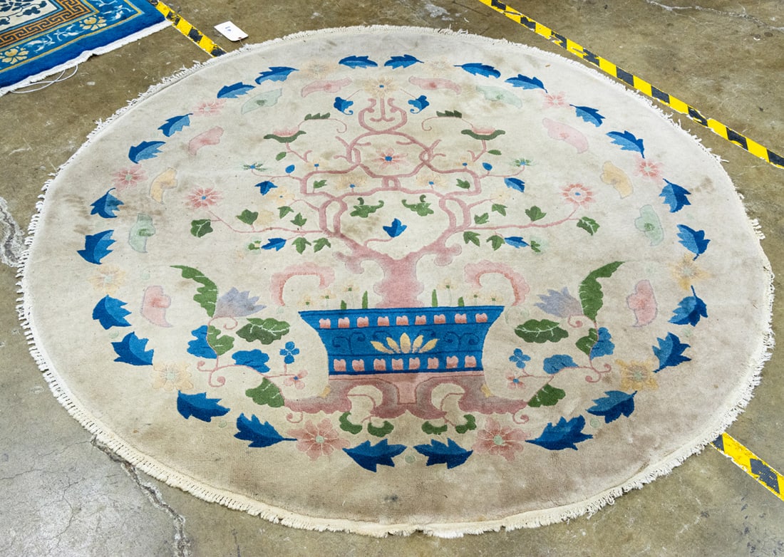 A Chinese Art Deco circular carpet: A Chinese Art Deco circular carpet, circa 1940, 6'dia