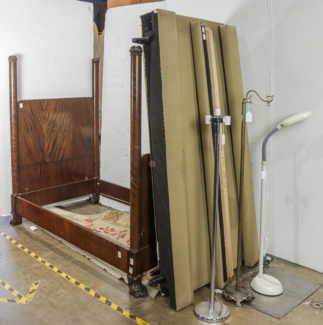 An assembled group of mainly furniture: An assembled group of mainly furniture, including a mahogany four poster bed, a modern queen size bed, three floor lamps, and a woven tapestry