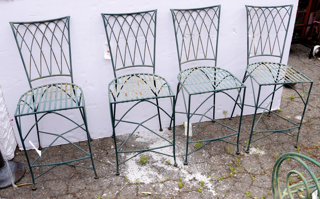 A set of four green painted iron patio bar stools: A set of four green painted iron patio bar stools, 43"h