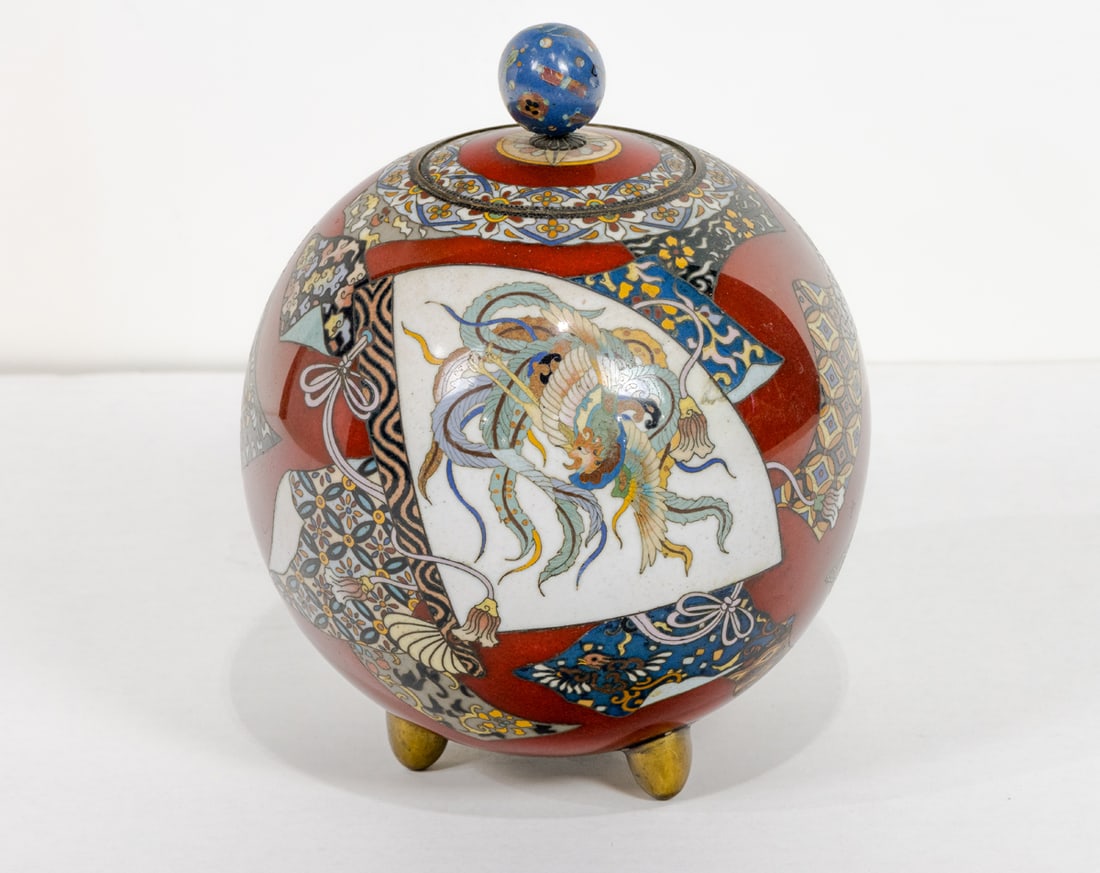 A Japanese cloisonne globular koro: A Japanese cloisonne globular koro. Featuring phoenix and floral motif, Meiji period, 7.5" high.