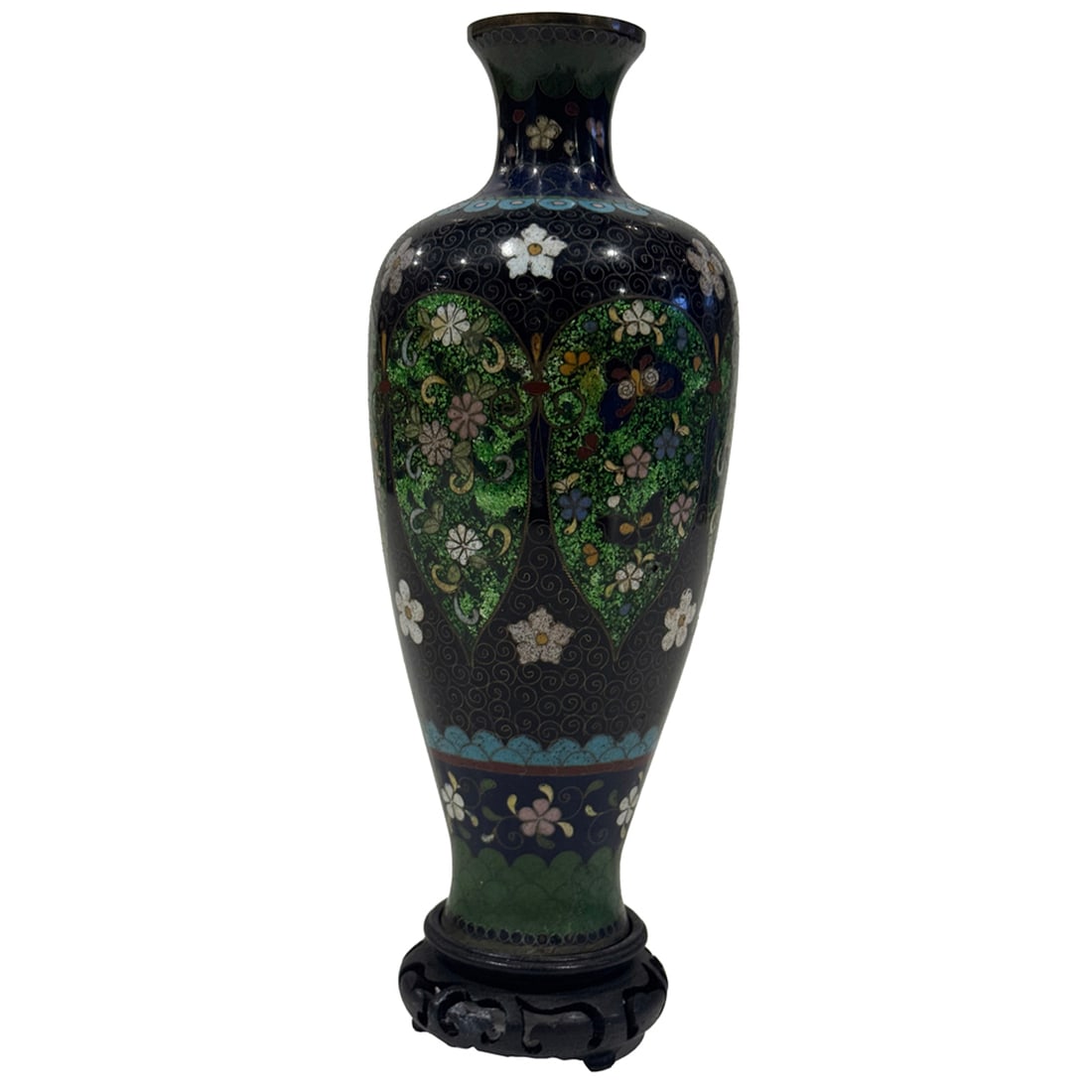 A Japanese cloisonne vase: A Japanese cloisonne vase. Featuring flower and butterfly motif, Meiji period, 9.125" high.