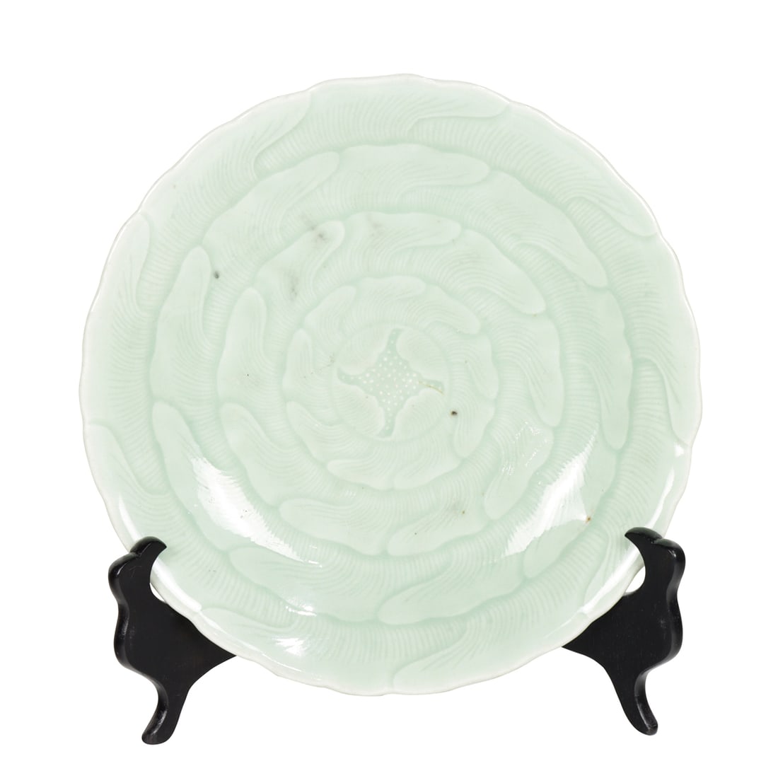 A Chinese celadon glazed and incise-decorated 'lotus' dish: A Chinese celadon glazed and incise-decorated 'lotus' dish. Qianlong six-character mark and of the period, 10.625" across.