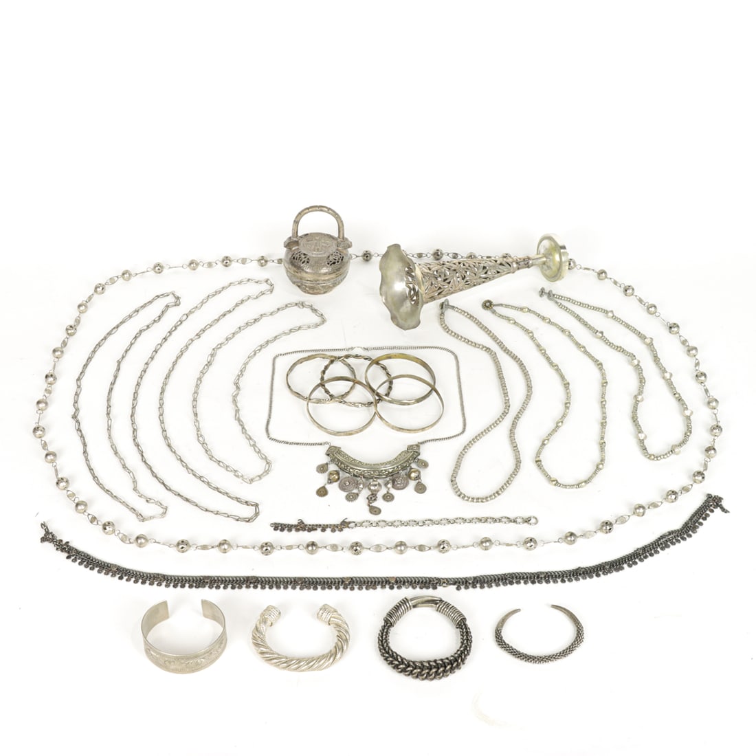 A group of Asian silver and silvered metal items: A group of Asian silver and silvered metal items. 20th century, 943 grams total weight.